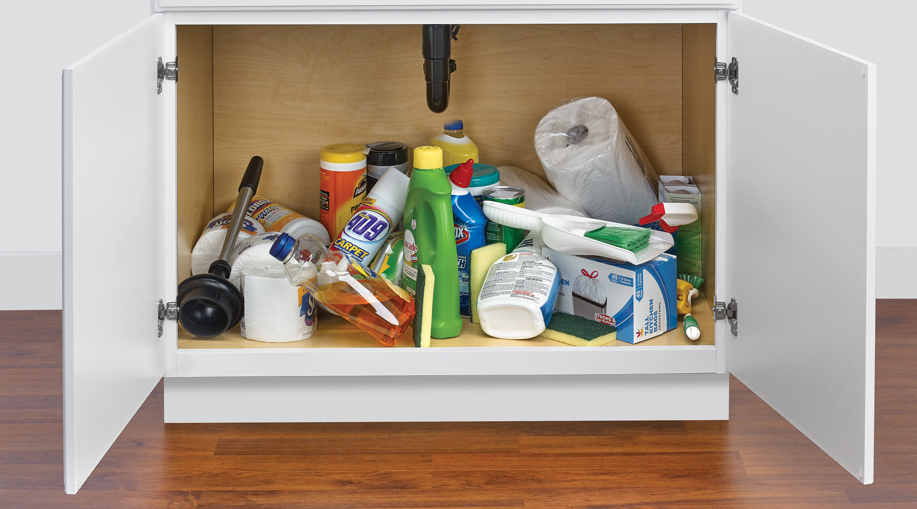 Cluttered under-sink cabinet